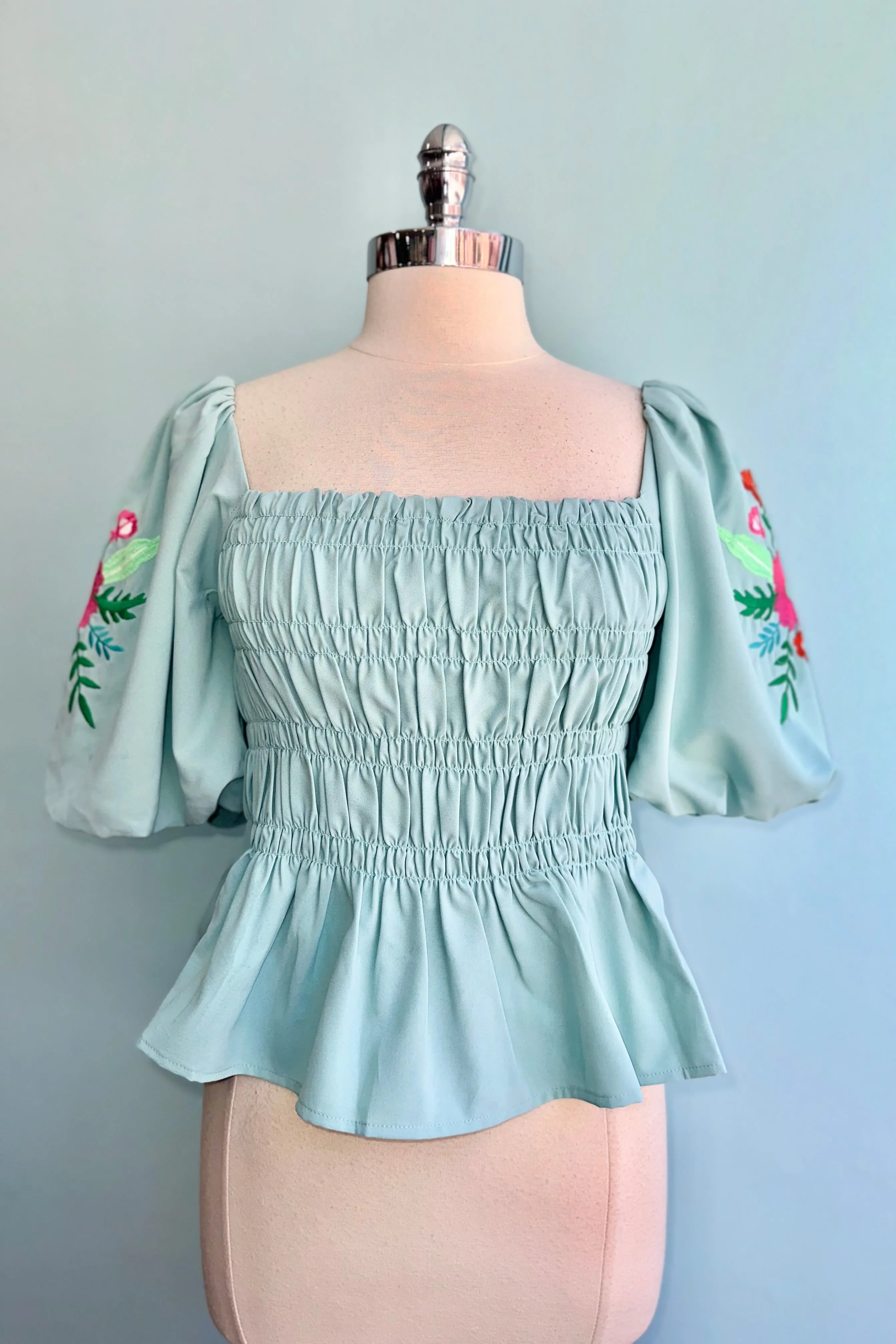 Aqua Embroidered Puff Sleeve Peplum Top