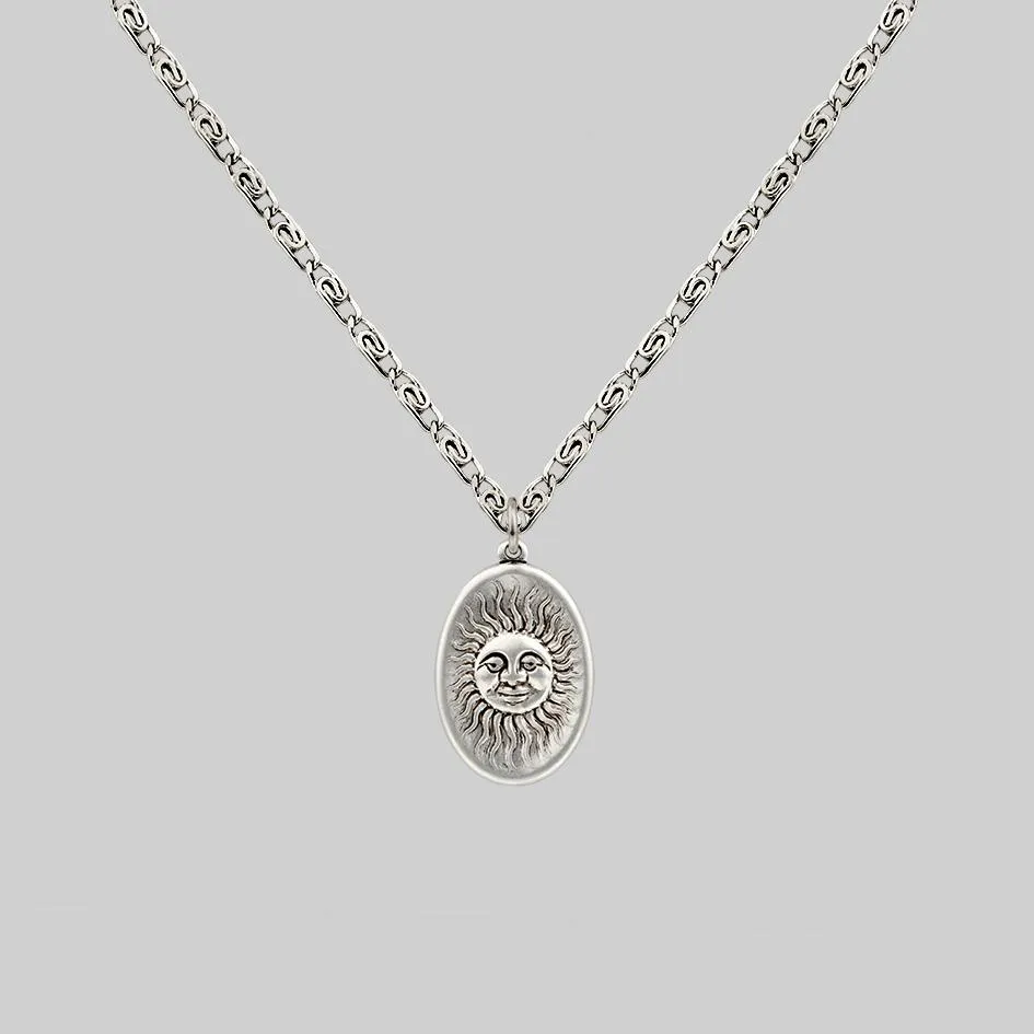 DAWN. Symbolic Sun Face Necklace - Silver