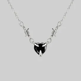 Sure! Heres an optimized product title: 

Elegant Silver Necklace with Barbed Wire and Black Onyx Heart Pendant